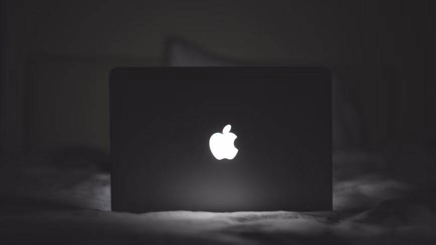 Apple TV 4K fourth generation front and side view on black background