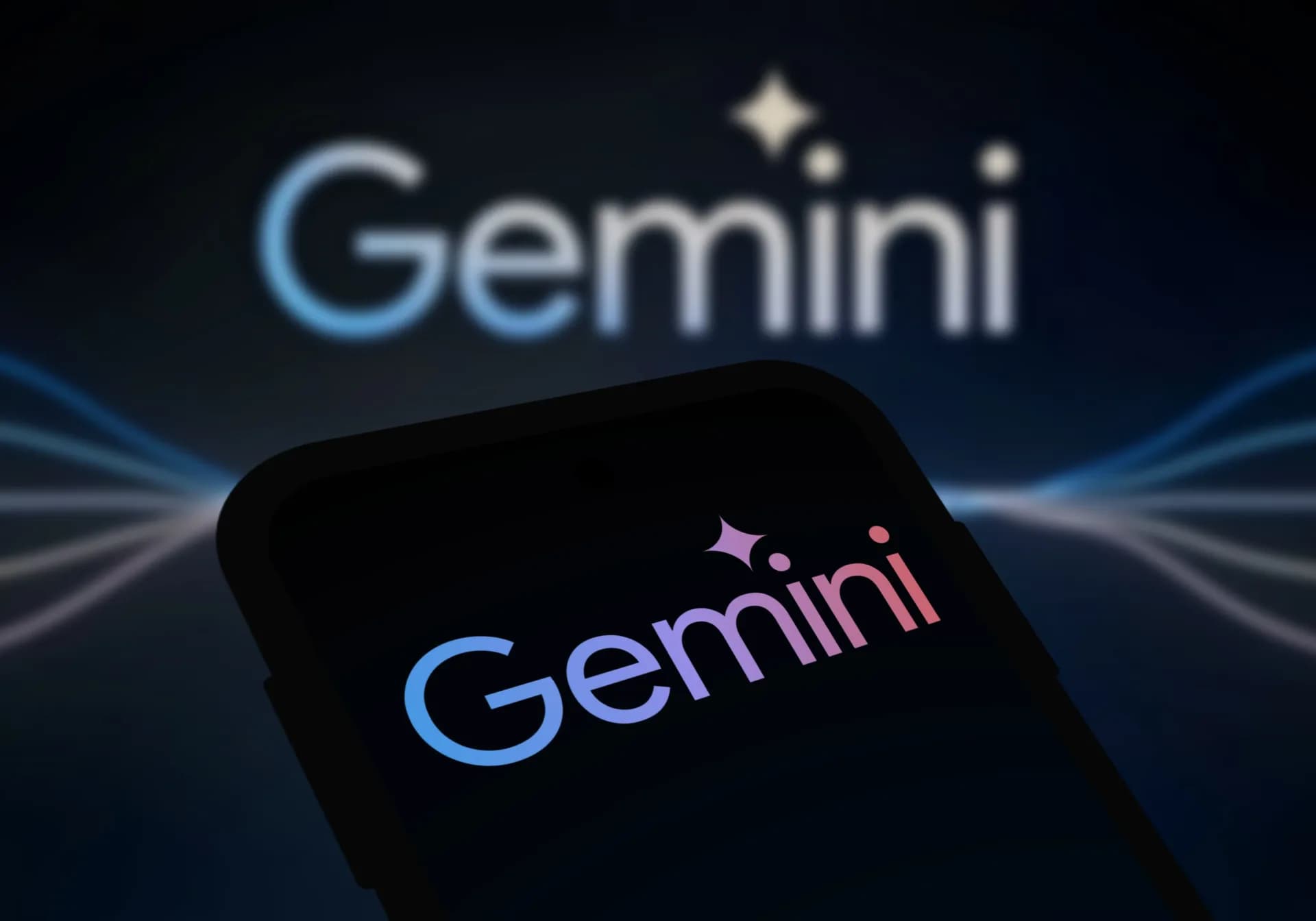 Google Gemini and Genie branding displayed on a dark screen representing the company's new AI model announcements.