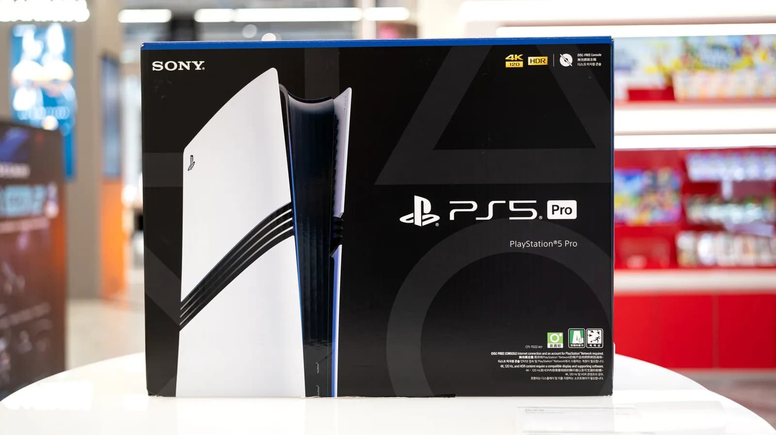 A PlayStation 5 Pro console next to an AMD Ryzen desktop processor box