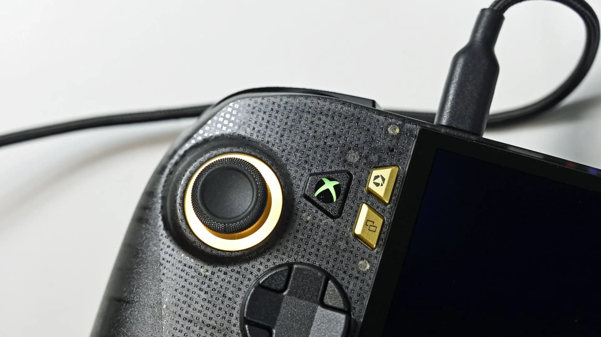 Xbox logo alongside the Windows 11 logo representing tension between Microsoft's Xbox and Windows teams