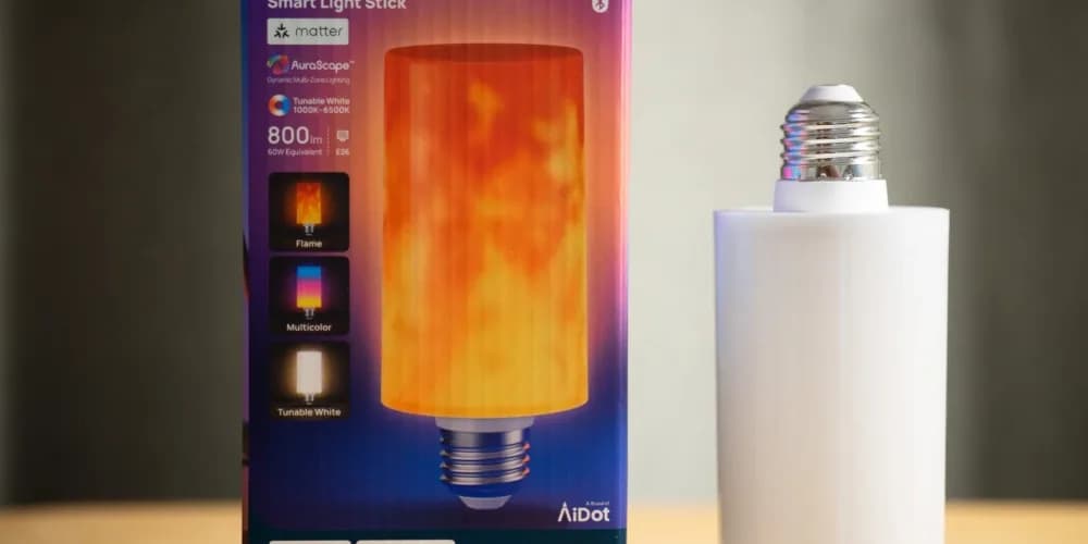 Linkind Smart Light Stick glowing inside an open glass table lamp fixture.