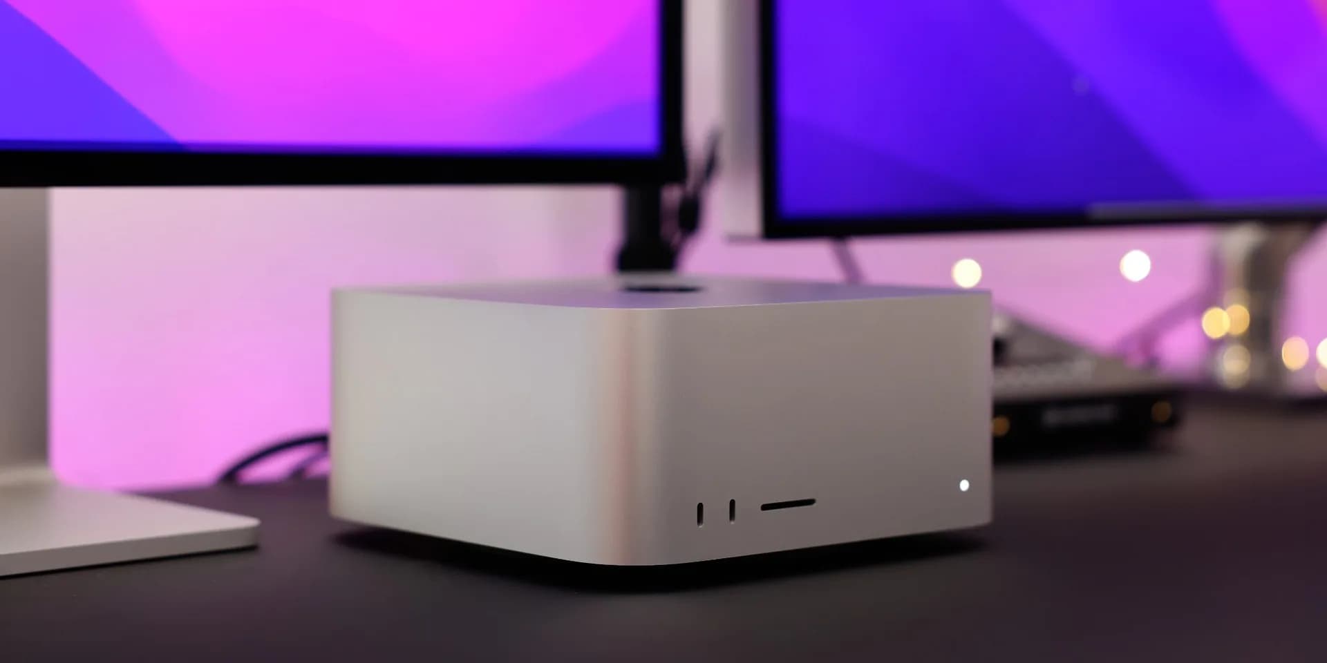 Apple Mac Studio desktop computer shown from the front on a desk